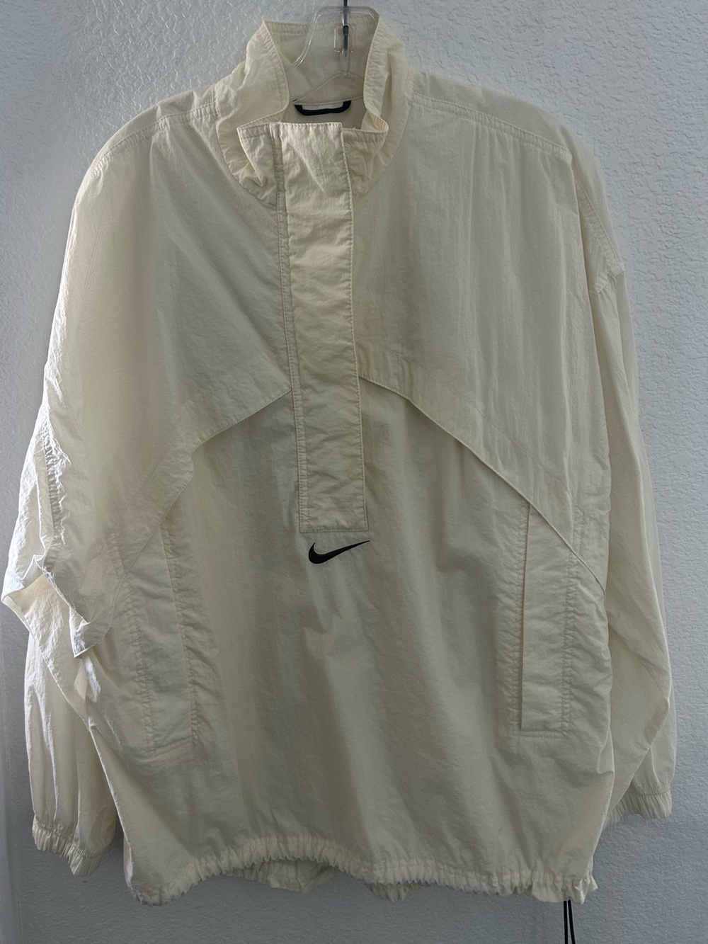 Nike Men’s Off-White Pullover Windbreaker with Black Swoosh